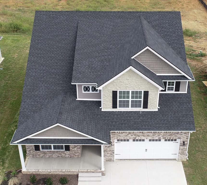 Aerial view of shingles installed by roofing contractors on new construction Mulberry Builders home.